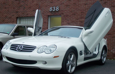 A 2004 Mercedes-Benz SL600 with custom doors by Luxury Details was recently in for routine maintenance.
